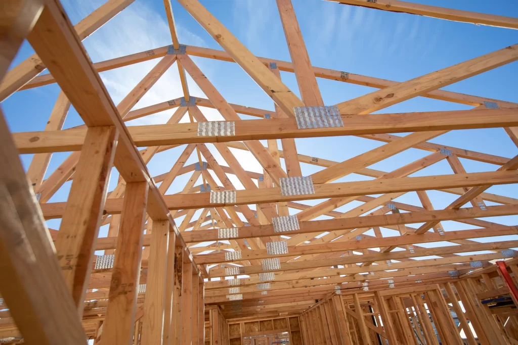 An image of the trusses of roof that is under construction